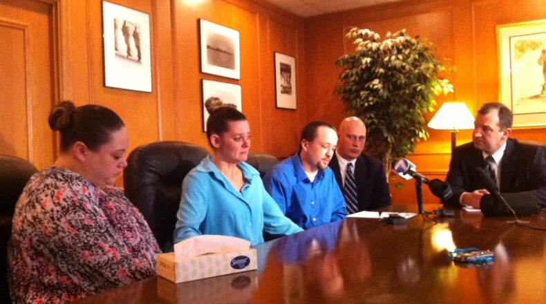 (left to right) Amber McGuire, Missie McGuire and husband Dennis McGuire, Rick Schulte, attorney and Jon Paul Rion, attorney.