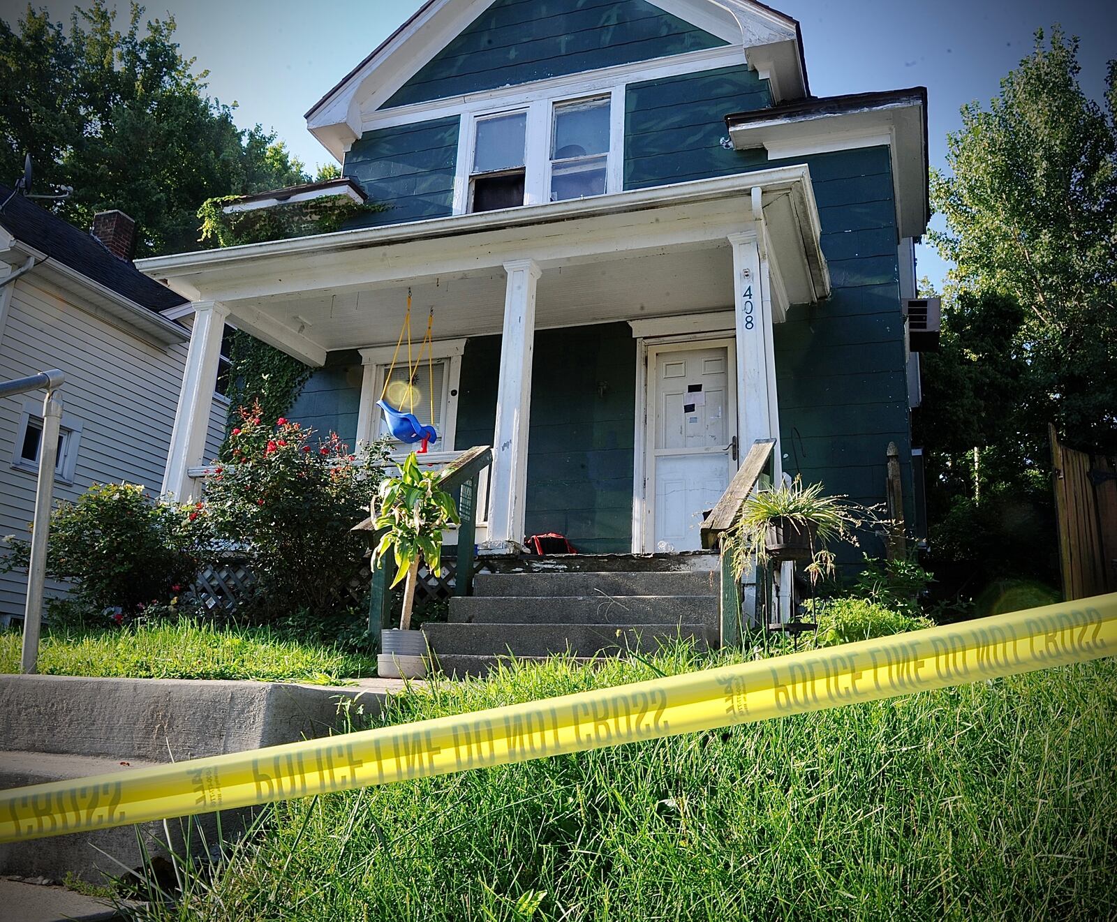 A badly decomposing body found under debris in the detached garage of a Burkhardt Avenue house on Thursday, Aug. 18, 2022, was later identified as 44-year-old CJ Pierce of Dayton, who was reported missing in July. MARSHALL GORBY / STAFF