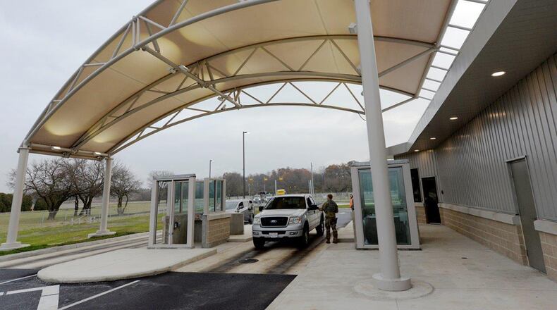 Members of the 88th Security Forces Squadron work the recently constructed and opened Gate 26A at Wright-Patterson Air Force Base Nov. 18. (U.S. Air Force photo/Ty Greenlees)