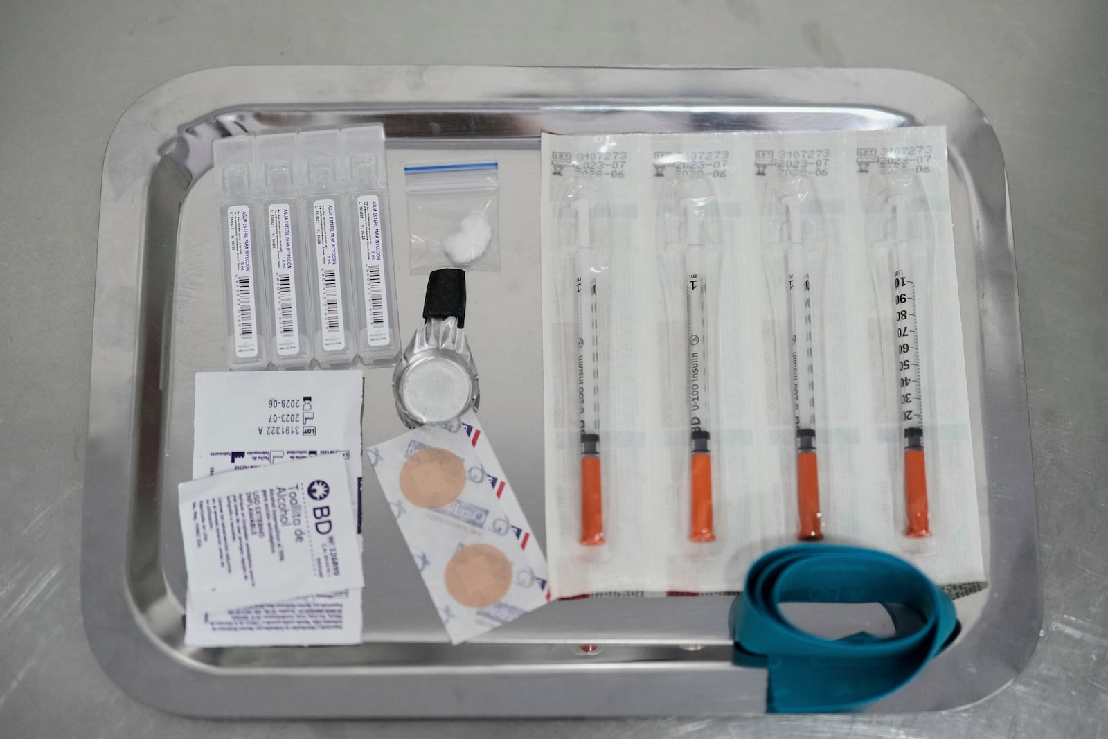 Injection kits sit at the Cambie supervised consumption room in Bogota, Colombia, where people who use substances receive supplies or bring their own drugs while learning safe practices, Sunday, April 27, 2025. (AP Photo/Fernando Vergara)
