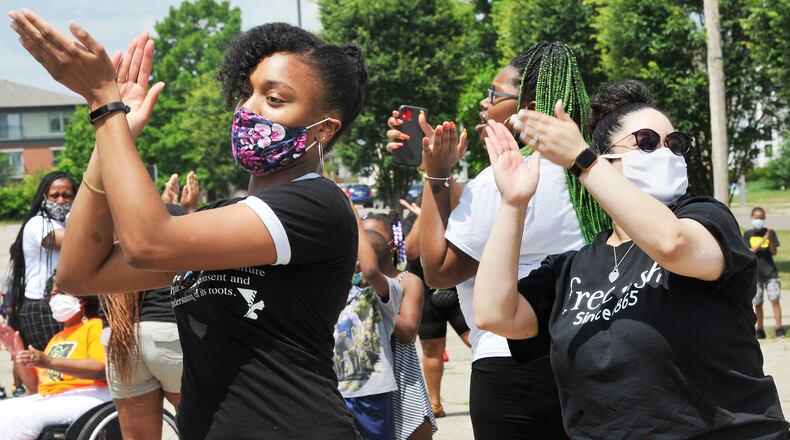 Freedom Schools scholars, their families, and staff spanning the program’s local presence of 15 years  joined together for singing, cheers and chants and celebration of Juneteenth Friday at the Richard Allen School. MARSHALL GORBY\STAFF