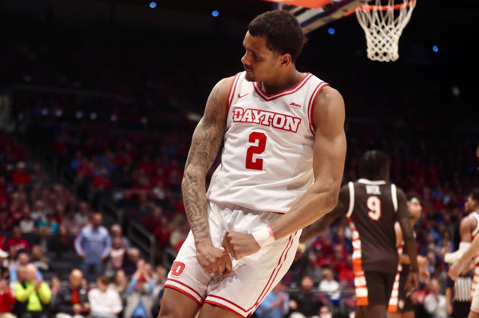Dayton's De'Shayne Montgomery reacts after a dunk against Bowling Green an exhibition game on Monday, Oct. 27, 2025, at UD Arena. David Jablonski/Staff
