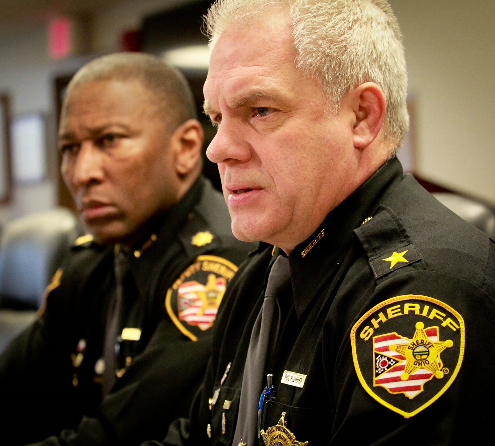 Montgomery County Sheriff Phil Plummer, foreground, and Major Daryl Wilson at a press conference last year. A mother and daughter who worked in the sheriff’s office are no longer with the department after a pending criminal investigation. FILE