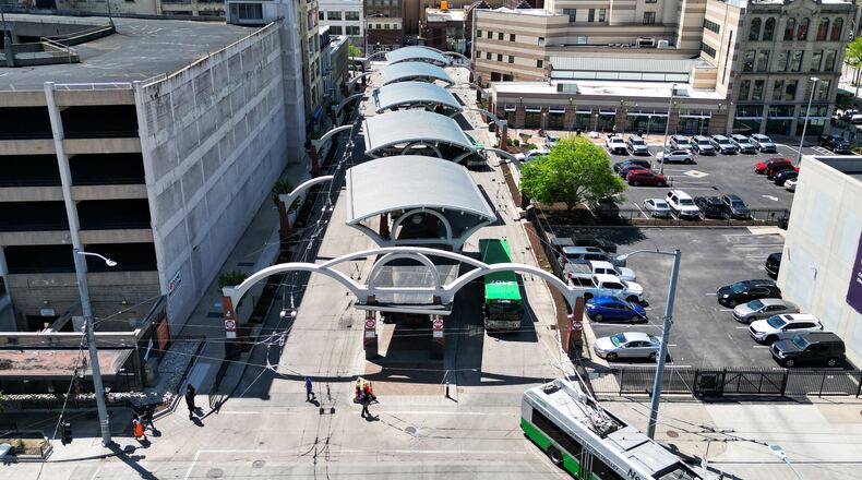 Dayton RTA buses exit the hub in downtown Dayton Wednesday, April 22, 2025. NICK GRAHAM/STAFF