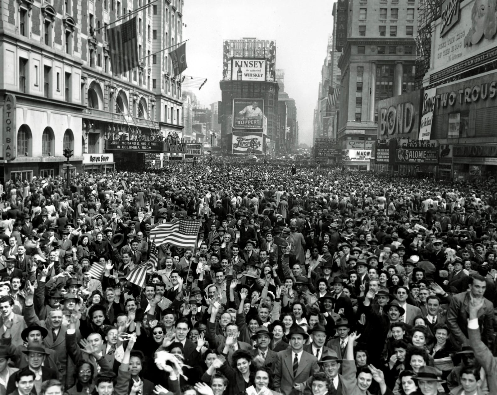 FILE - Looking north from 44th Street, New York's Times Square is packed Monday, May 7, 1945, with crowds celebrating the news of Germany's unconditional surrender in World War II. (AP Photo/Tom Fitzsimmons, File)