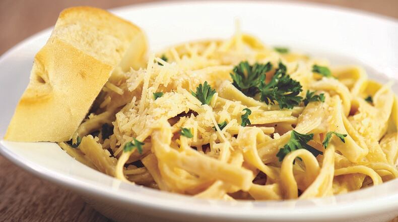 Thickened low-fat milk can be used in lieu of heavy cream in dishes like fettuccine alfredo.