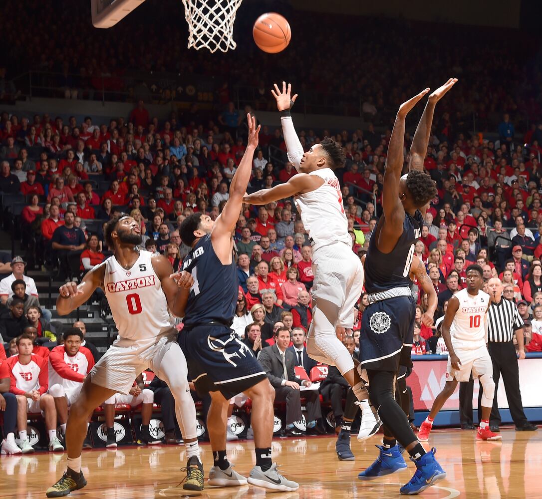 PHOTOS: Dayton rallies to beat Akron