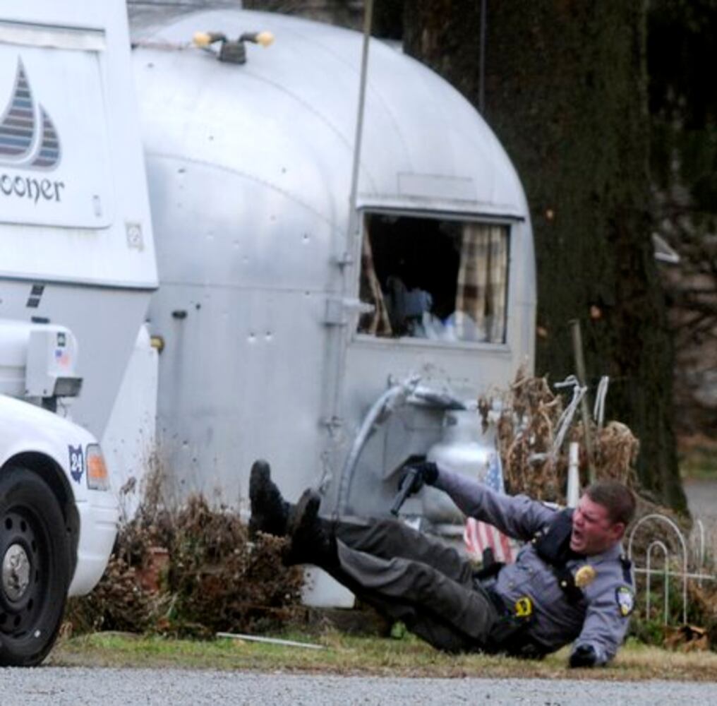 Patrolman shot at Enon Beach