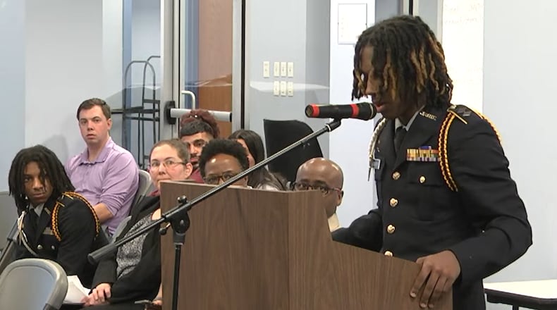 Meadowdale junior Brandon Wadsworth speaks at the podium during a Dayton Public Schools meeting regarding moving the Army JROTC program from Meadowdale High School to Dunbar High School. Courtesy of Dayton Public Schools.