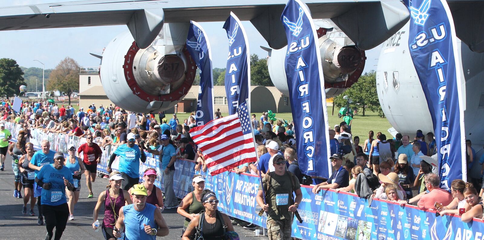Runners finish at the 22nd annual Air Force Marathon on Saturday, Sept. 15, 2018, at Wright-Patterson Air Force Base. Northwestern High School graduate and former Wright State runner Jacob McCubbin, 28, won the men s race, and Sarah Bishop, 36, a mother of four who attended high school in Alaska and ran track at Auburn, won the women's race. The event attracted thousands of runners from all 50 states and eight countries. (David Jablonski/Staff)
