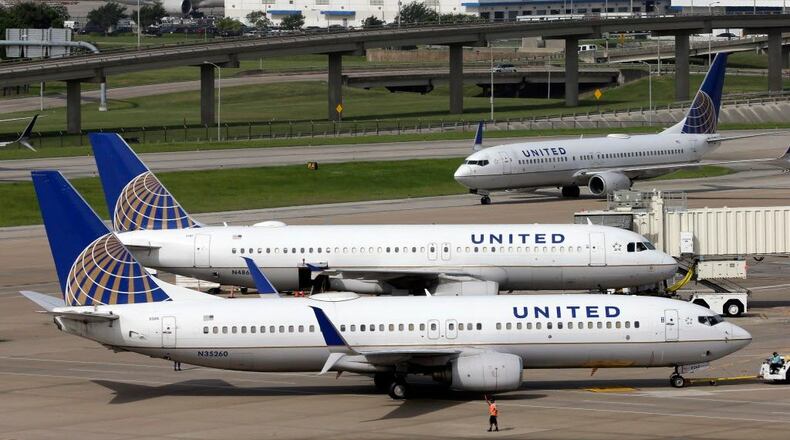 A United Airlines jet is pushed back from a gate at George Bush Intercontinental Airport in Houston on July 8, 2015.