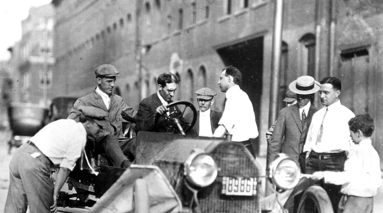Charles F. Kettering, at the wheel and Bill Chryst, in passenger seat, test the Delco self starter system that Kettering invented in Dayton. PHOTO COURTESY OF DAYTON HISTORY