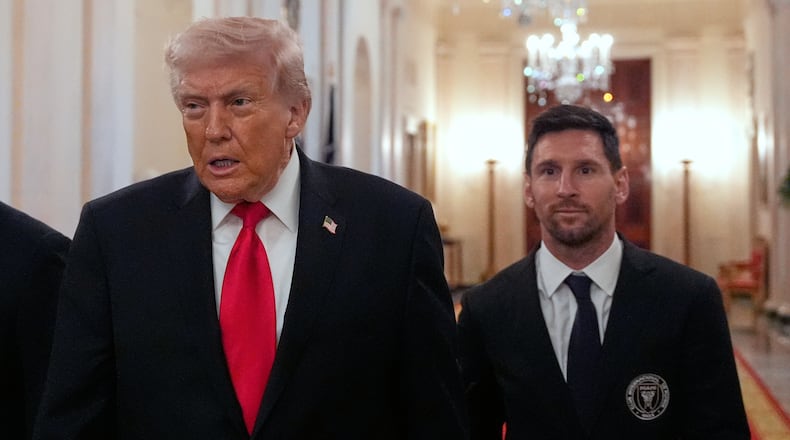 Lionel Messi arrives with President Donald Trump at an event to honor the 2025 Major League Soccer champions Inter Miami CF in the East Room of the White House, Thursday, March 5, 2026, in Washington. (AP Photo/Alex Brandon)