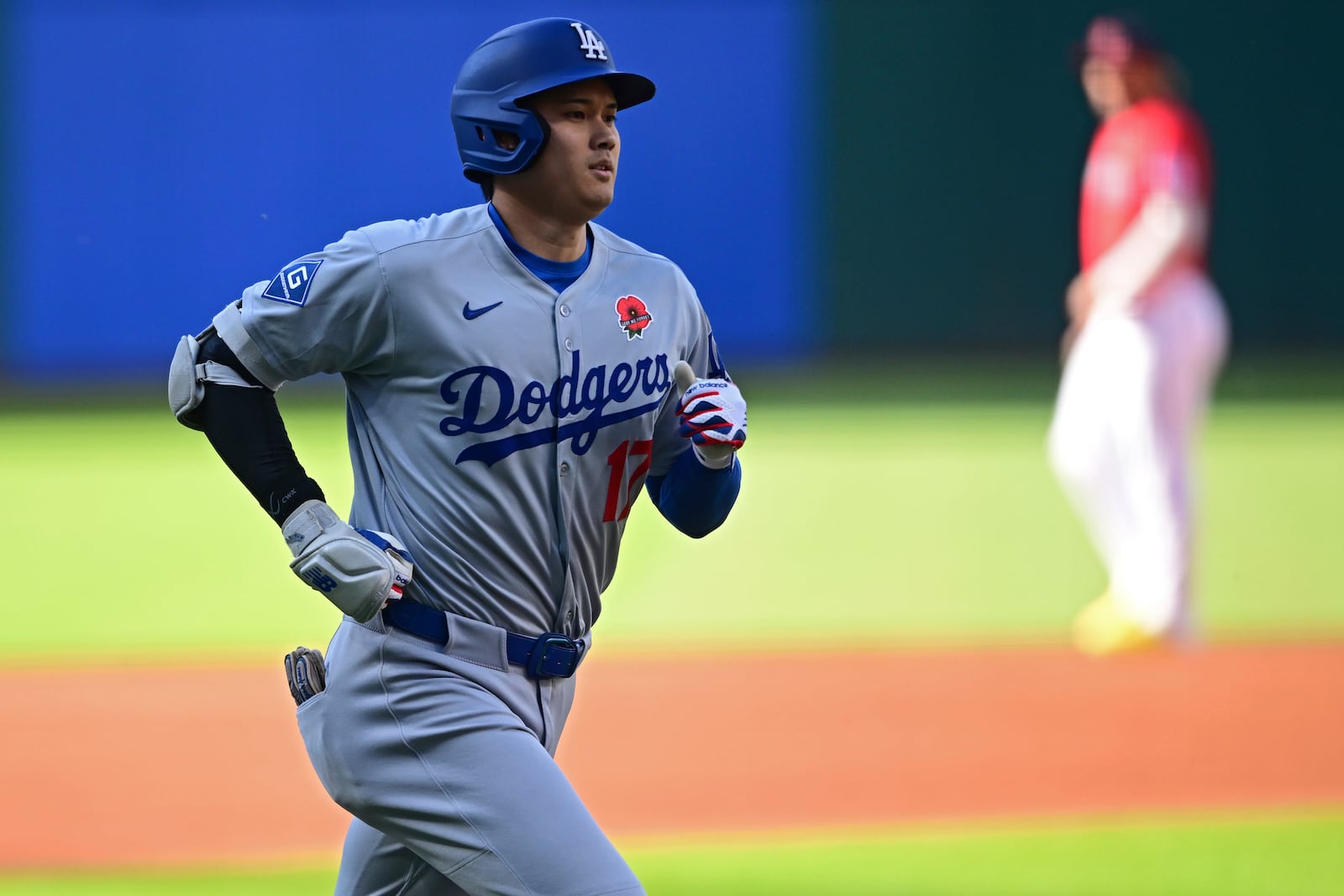 Los Angeles Dodgers' Shohei Ohtani runs after hitting a solo home run off Cleveland Guardians starting pitcher Gavin Williams during the first inning of a baseball game, Monday May 26, 2025, in Cleveland. (AP Photo/David Dermer)