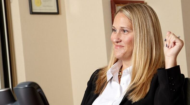 Erin Rhinehart, Co-Managing Partner at Faruki PLL