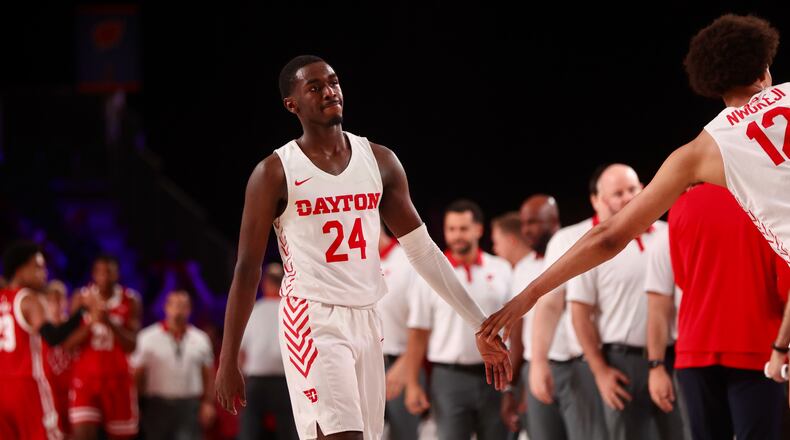 Dayton's Kobe Elvis leaves the court after a loss against Wisconsin on Wednesday, Nov. 23, 2022, in the first round of the Battle 4 Atlantis at Imperial Arena at the Paradise Island Resort in Nassau, Bahamas. David Jablonski/Staff