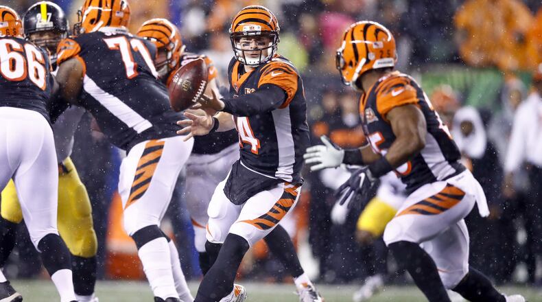 CINCINNATI, OH - DECEMBER 04: Andy Dalton #14 of the Cincinnati Bengals shovels a pass to Giovani Bernard #25 against the Pittsburgh Steelers during the second half at Paul Brown Stadium on December 4, 2017 in Cincinnati, Ohio. (Photo by Andy Lyons/Getty Images)