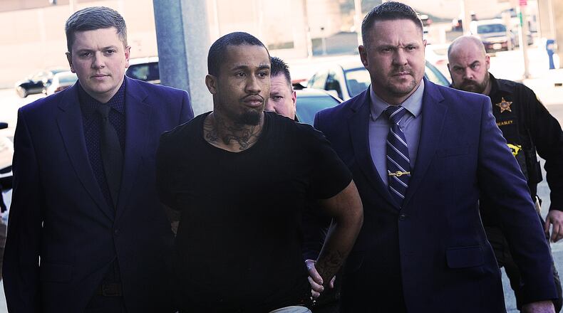 Members of the Montgomery Sheriff's Department escort homicide suspect Sha'king Jones last week to the Montgomery Jail. MARSHALL GORBY\STAFF