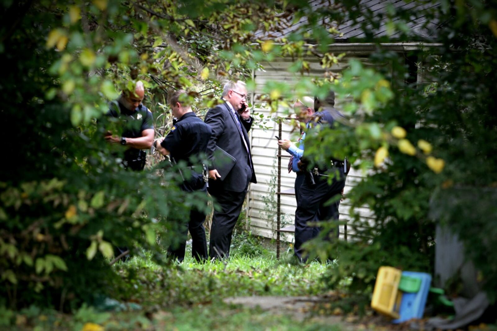 Dayton police are investigating the discovery of a body Monday afternoon, Sept. 25, 2017, behind a house on West Hudson Avenue in Dayton.