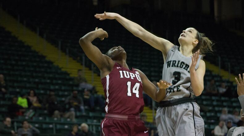 Wright State’s Emily Vogelpohl defends IUPUI’s Danielle Lawrence during Sunday’s game at the Nutter Center. Allison Rodriguez/CONTRIBUTED