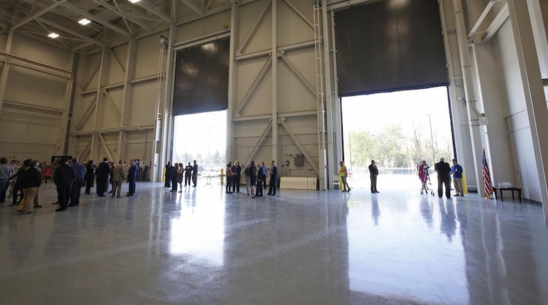 The National Air and Space Intelligence Center held a ribbon-cutting ceremony for the then-new Haynes Hall facility on Wright-Patterson Air Force Base in this 2017 file photo. The $29.5 million, 58,000 square-foot building resembles a large airplane hangar and will be used for foreign materiel exploitation, NASIC said at the time. TY GREENLEES / STAFF