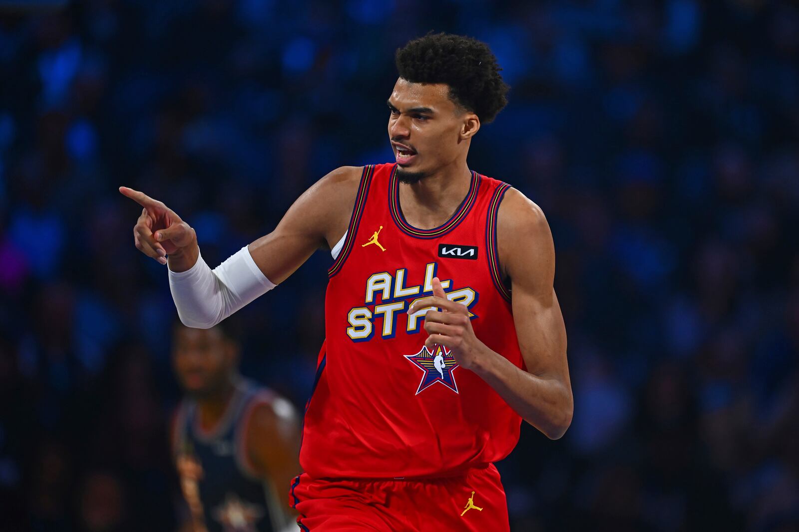 Chuck's Global Stars' Victor Wembanyama (1) gestures after sinking a basket against the Kenny's Young Stars during Game 1 of the NBA All-Star Game at Chase Center in San Francisco, Sunday, Feb. 16, 2025. (Jose Carlos Fajardo/Bay Area News Group via AP)