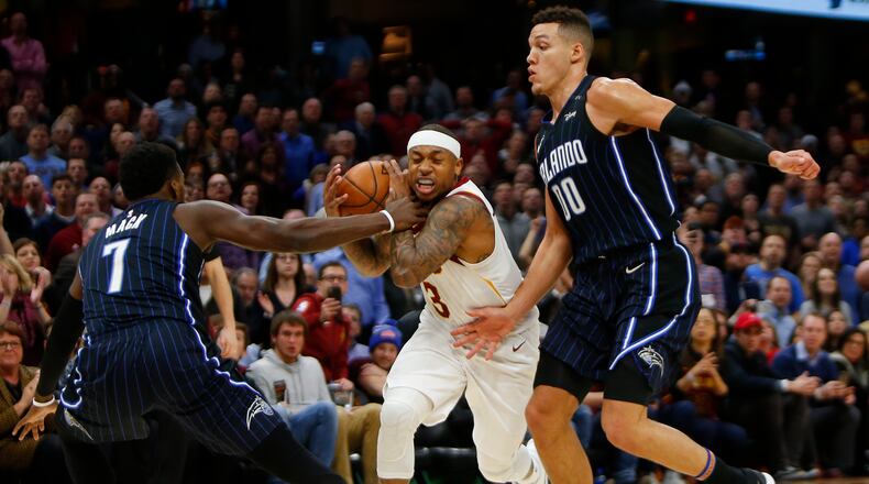 CLEVELAND, OH - JANUARY 18: Isaiah Thomas #3 of the Cleveland Cavaliers is fouled late in the game by Shelvin Mack #7 of the Orlando Magic at Quicken Loans Arena on January 18, 2018 in Cleveland, Ohio. (Photo by Justin K. Aller/Getty Images)