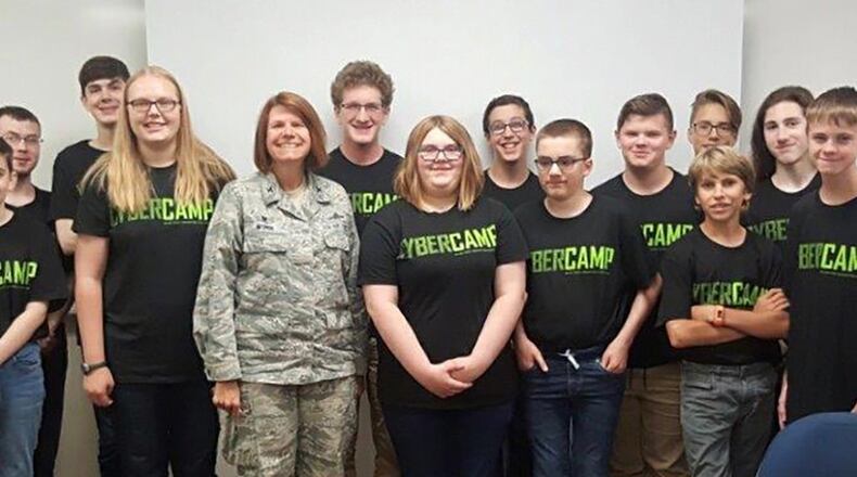 Col. Lori Winn, 88th Communications Group commander, Wright-Patterson Air Force Base, stands with this year’s attendees at a local CyberCamp. Air Force Association CyberCamps began in 2015 as a way to give students the opportunity to learn about cybersecurity during the summer months, regardless of their previous knowledge or education in cybersecurity. They are also designed to stimulate year-round interest in science, technology, engineering and mathematics. (Contributed photo)