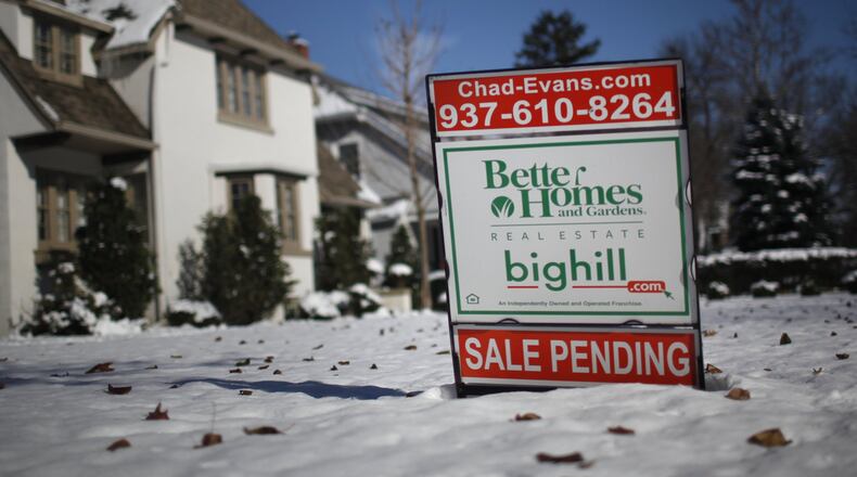 Property values in Montgomery County are generally going up according to County Auditor Karl Keith. This home sale sign is on Volusia Ave. in Oakwood.. TY GREENLEES / STAFF
