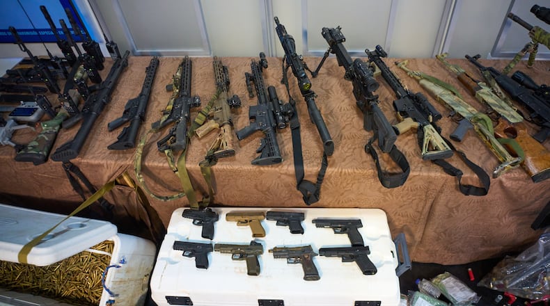 Weapons that Cuban authorities say were recovered from a speedboat in Cuban waters following a confrontation that left four people dead are displayed during a media presentation in Havana, Friday, Feb. 27, 2026. (AP Photo/Ramon Espinosa)