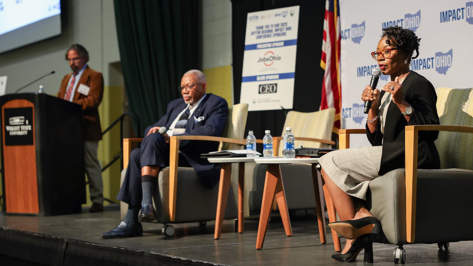 Dayton city commissioner Shenise Turner-Sloss, who is challenging Jeffrey Mims Jr. for mayor, speaks during a panel in the Ohio Chamber's 2025 Dayton Regional Impact Ohio Conference on Tuesday, Aug. 26, in the Apollo Room in the Student Union at Wright State University. The panel was moderated by Dayton Daily News investigations editor Josh Sweigart (left). BRYANT BILLING / STAFF