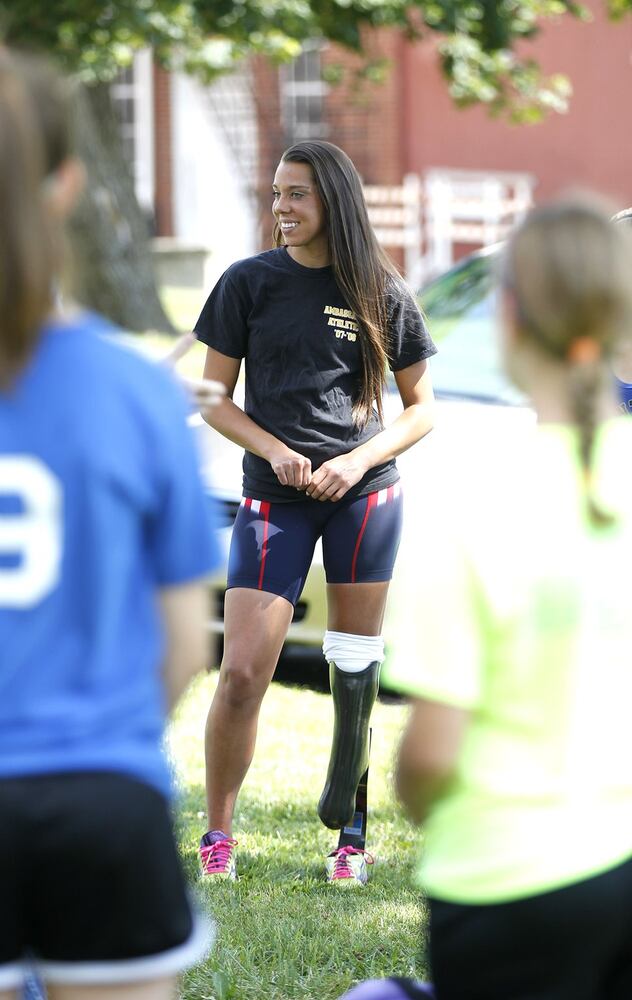 High school junior sets paralympic world records
