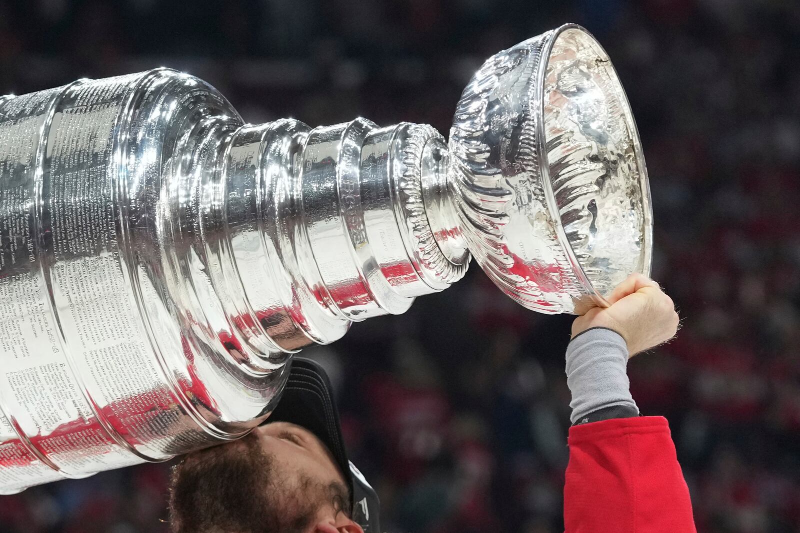 FILE - Florida Panthers center Sam Reinhart (13) kisses the Stanley Cup after defeating the Edmonton Oilers in Game 6 of the NHL hockey Stanley Cup Final Tuesday, June 17, 2025, in Sunrise, Fla. (AP Photo/Lynne Sladky, File)