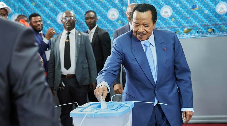 President Paul Biya casts his ballot at the Government Bilingual primary school Bastos in Yaounde, Cameroon, Saturday, Oct. 12, 2025 (AP Photo/Angel Ngwe)