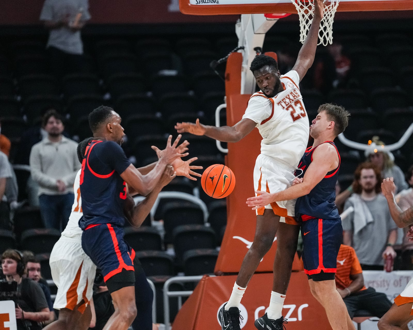 Texas forward Lassina Traore (23) guards Virginia during the NCAA college basketball game at the Moody Center in Austin, Wednesday, Dec. 3, 2025.  (Mikala Compton/Austin American-Statesman via AP)