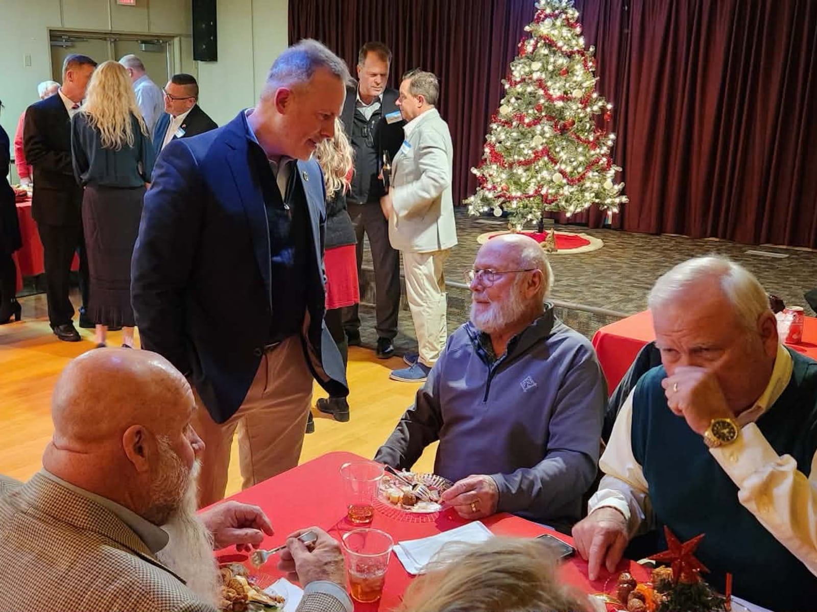 Montgomery County Clerk of Courts Mike Foley can be seen in the background of this photo posted to Facebook by Ohio Treasurer Robert Sprague. The Ohio Auditor of State is asking court officials to determine if Foley was drinking alcohol in violation of his probation.