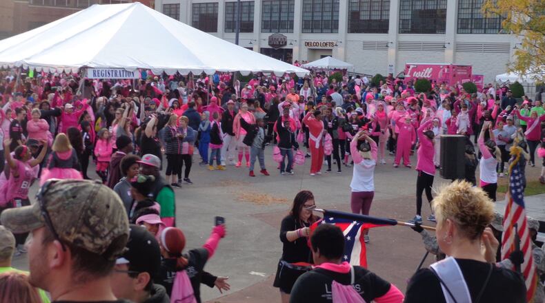 Thousands of walkers gather at last year’s Making Strides Against Breast Cancer walk outside Fifth Third Field in downtown Dayton. CONTRIBUTED