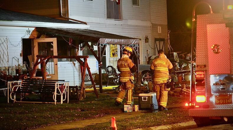 A Fairborn firefighter was injured and a family dog killed in a house fire Monday night, Nov. 21, 2022, on Cleary Drive. MARSHALL GORBY/STAFF