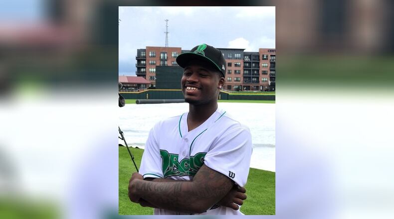 Dragons third baseman Cam Collier talks to the media Thursday at Day Air Ballpark. Tom Archdeacon/CONTRIBUTED