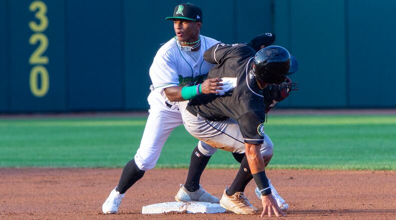 Dayton shortstop Trey Faltine looks for the umpire's call after Lansing's Junior Perez tried to steal second base in the first inning Wednesday at Day Air Ballpark. Perez was called out. Jeff Gilbert/CONTRIBUTED
