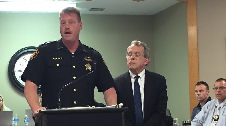 Pike County Sheriff Charles Reader and Ohio Attorney General Mike DeWine at an afternoon news conference to discuss the 2016 slayings of 8 people in Pike County. BOB GARLOCK/STAFF