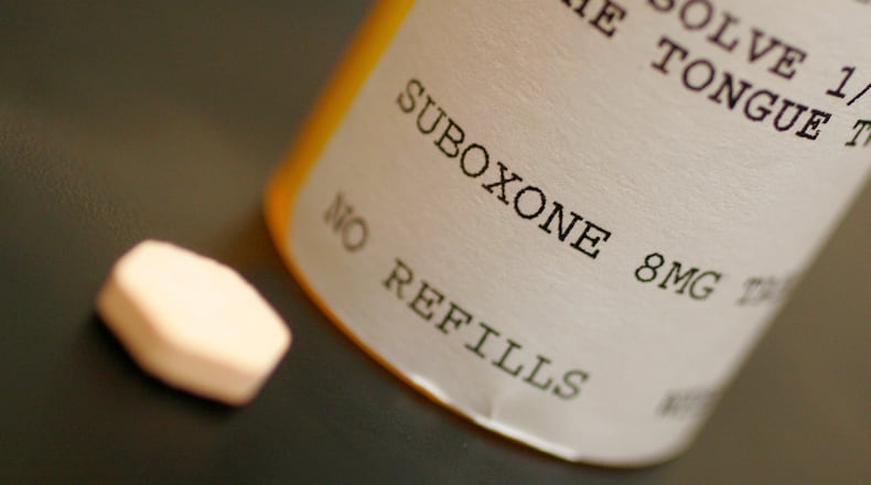 Recovering heroin addict Eli Day takes twice-daily doses of Suboxone the at Creekside treatment facility in Xenia.