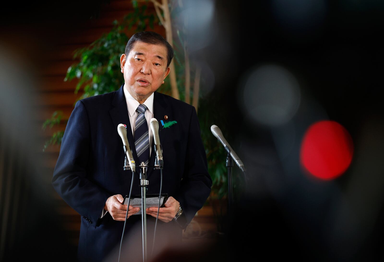 Japanese Prime Minister Shigeru Ishiba speaks to reporters reacting after a Japanese negotiator held ministerial talks at the White House regarding U.S. tariffs, at the prime minister's office in Tokyo, Japan, Thursday, April 17, 2025. (Franck Robichon/Pool Photo via AP)
