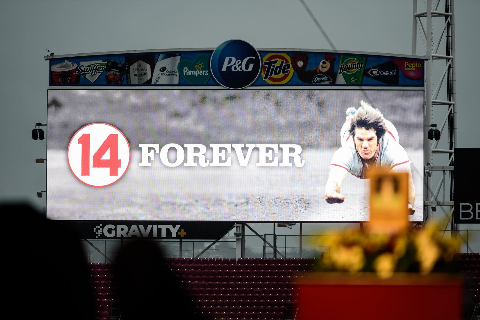 Thousands of Reds fans braved the steady rains to pay their respects to Cincinnati Reds legend and Major League Baseball’s all-time hits leader Pete Rose for a memorial visitation on Sunday, Nov. 10, 2024, at Great American Ball Park. Hosted by the Cincinnati Reds and Rose’s family, the visitation lasted 14 hours, a tribute to the “Hit King’s” jersey number. Rose died on Sept. 30 at the age of 83. TOM GILLIAM / CONTRIBUTING PHOTOGRAPHER