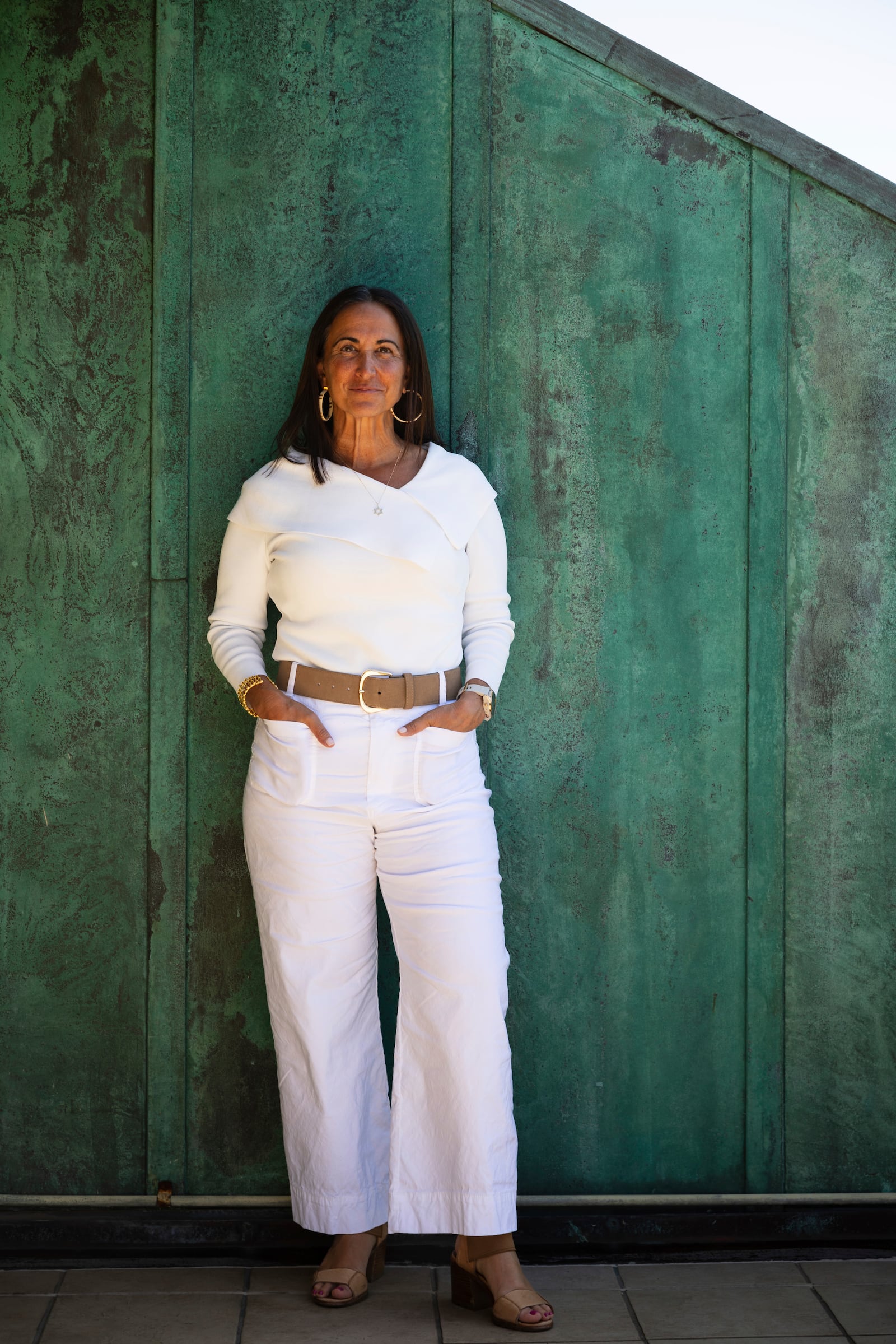 President of Samueli Family Philanthropies Lindsey Spindle stands outside her office in Corona Del Mar, Calif., Monday, July 7, 2025. (AP Photo/Zoë Meyers)