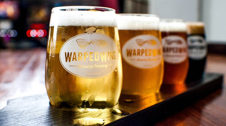 A flight of beers from Warped Wing's downtown Dayton location. CONTRIBUTED