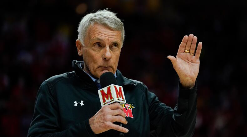 Former Maryland head coach Gary Williams speaks as his 2002 national championship is honored during a timeout in the first half of an NCAA college basketball game between Maryland and Ohio State, Sunday, Feb. 27, 2022, in College Park, Md. (AP Photo/Julio Cortez)