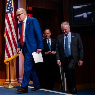 FILE — Senate Minority Leader Chuck Schumer (D-N.Y.), Sen. Tim Kaine (D-Va.), and Sen. Adam Schiff (D-Calif.) arrive at a news conference after the Senate blocked a resolution that sought to force President Donald Trump to seek congressional approval for any U.S. military action related to Venezuela at the U.S. Capitol in Washington, Jan. 14, 2026. Schumer called for Republicans to break off the homeland security funding measure and allow the Senate to approve funding for the rest of the government. (Eric Lee/The New York Times)