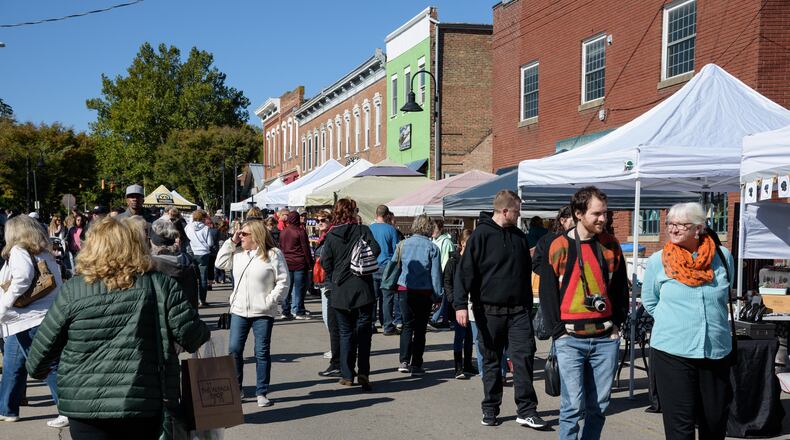 The Yellow Springs Street Fair and Music & Beer Fest — a day of art, music, street performers, food and beer — took over the downtown Yellow Springs on Saturday, Oct. 12. The street fair featured more than 250 handmade arts and crafts vendors, live music and local craft beer. TOM GILLIAM / CONTRIBUTING PHOTOGRAPHER
