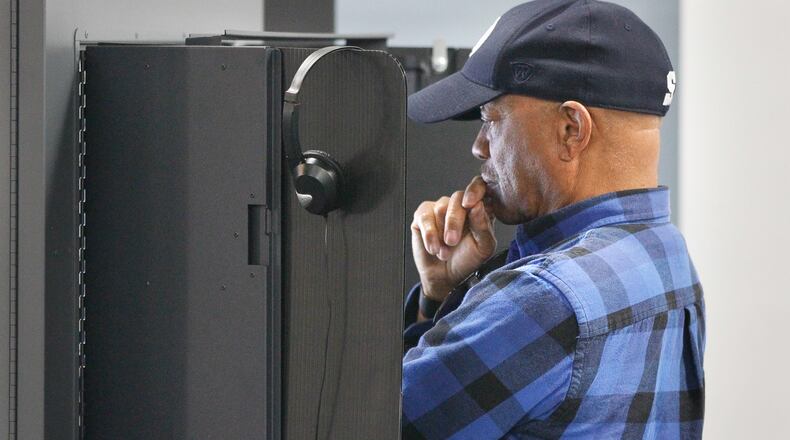In this file photo, Forest Wortham of Washington Twp. casts his ballot on Montgomery County’s new equipment at his polling location at the Washington Twp. Recreation Center. CHRIS STEWART / STAFF